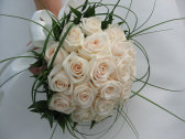 white rose bouquet with bear grass